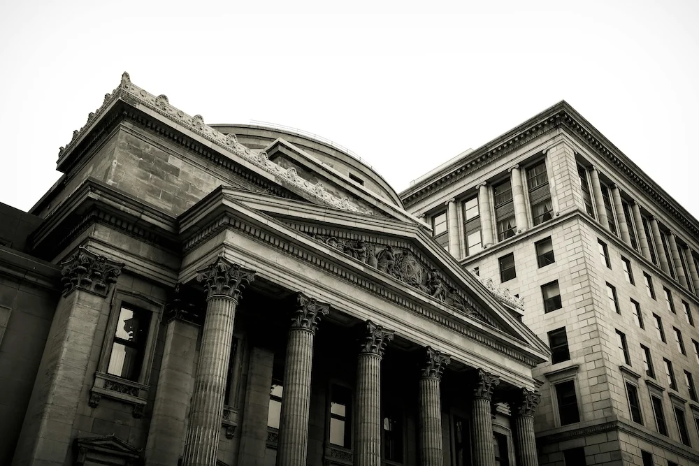 Stone façade and columns of a traditional bank building